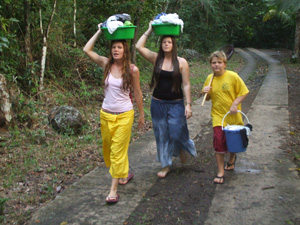 Carrying laundry from the stream in Guadaloupe