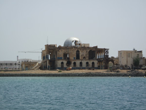 Bombed out structure standing over Massawa Harbour, Eritrea