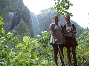 Emily and Amanda in front of Vaipo Waterfall, Nuku Hiva, French Polynesia